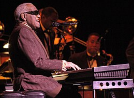 Ray Charles was an iconic American singer, pianist, and songwriter known for pioneering soul music.